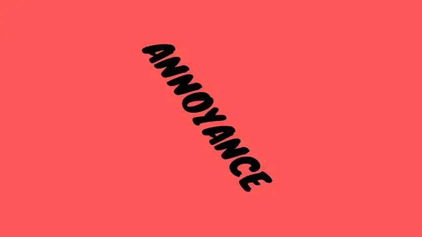 A picture with a Red/Orange background with black font slanted down spelling out &ldquo;Annoyance&rdquo;